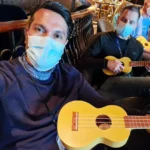 Cruising with Danny and Peter, Holland America Line, Koningsdam, Pacific Ocean, Sea Day | Guests enjoying a Hawaiian cruise experience, participating in cultural activities at sea, including lei-making, ukulele workshops, and hula dance lessons, surrounded by the beauty of the ocean and the spirit of Aloha.