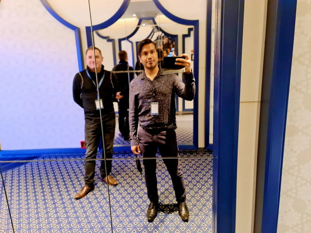 Cruising with Danny and Peter, Holland America Line, Koningsdam, Pacific Ocean, Sea Day | Passengers enjoying a tranquil Holland America sea day aboard a luxury cruise ship, participating in ocean voyage activities such as ukulele lessons, savoring gourmet dining at sea, and relaxing by the pool while overlooking the serene waters. The elegant ship provides panoramic ocean views and a perfect setting for a memorable Holland America Line experience. The day also includes presentations on maritime history, reflecting the ultimate luxury travel experience at sea.