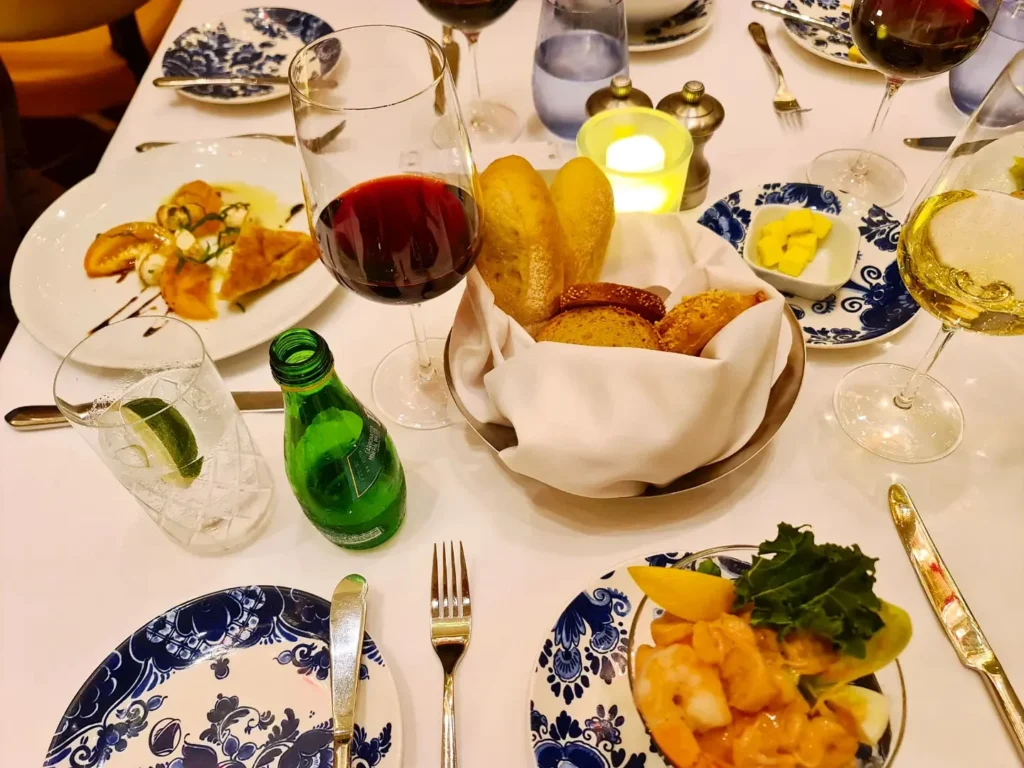 Cruising with Danny and Peter, Holland America Line, Koningsdam, Pacific Ocean, Sea Day | Group of travelers enjoying ukulele lessons on the deck of a cruise ship during an ocean voyage. Vibrant sunset over the sea, showcasing the essence of Hawaiian culture. Participants performing in a live music at sea event, celebrating their ukulele performances together, surrounded by the beauty of the ocean and the warmth of camaraderie.