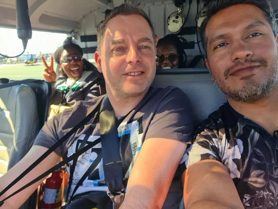 Cruising with Danny and Peter, Holland America Line, Koningsdam, Honolulu, Hawaii, United States | Stunning aerial view of Waikiki Beach from a Hawaii helicopter tour, capturing the turquoise waters, golden sands, and iconic skyline. Majestic Ko'olau Mountains flight showcasing the lush, rugged peaks of Oahu from above. Pearl Harbor aerial view offering a solemn and powerful glimpse of the historic site. Scenic helicopter ride over Hawaii’s coast, revealing the island’s breathtaking landscapes and vibrant colors. An unforgettable Hawaii sightseeing adventure highlighting the beauty of Oahu’s windward coast, north shore, and serene tropical rainforests.