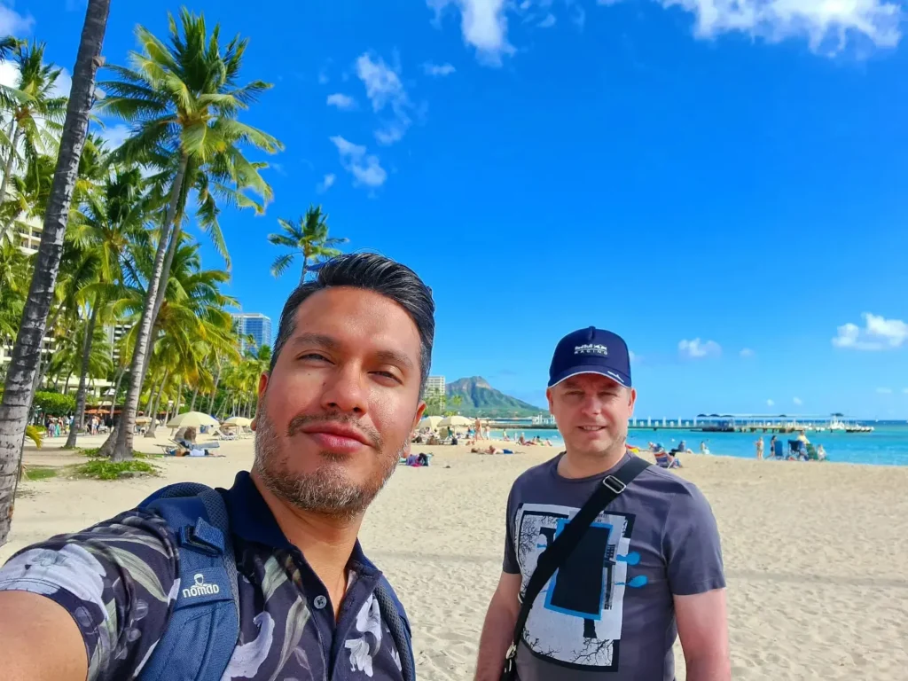 Cruising with Danny and Peter, Holland America Line, Koningsdam, Honolulu, Hawaii, United States | Stunning aerial view of Waikiki Beach from a Hawaii helicopter tour, capturing the turquoise waters, golden sands, and iconic skyline. Majestic Ko'olau Mountains flight showcasing the lush, rugged peaks of Oahu from above. Pearl Harbor aerial view offering a solemn and powerful glimpse of the historic site. Scenic helicopter ride over Hawaii’s coast, revealing the island’s breathtaking landscapes and vibrant colors. An unforgettable Hawaii sightseeing adventure highlighting the beauty of Oahu’s windward coast, north shore, and serene tropical rainforests.