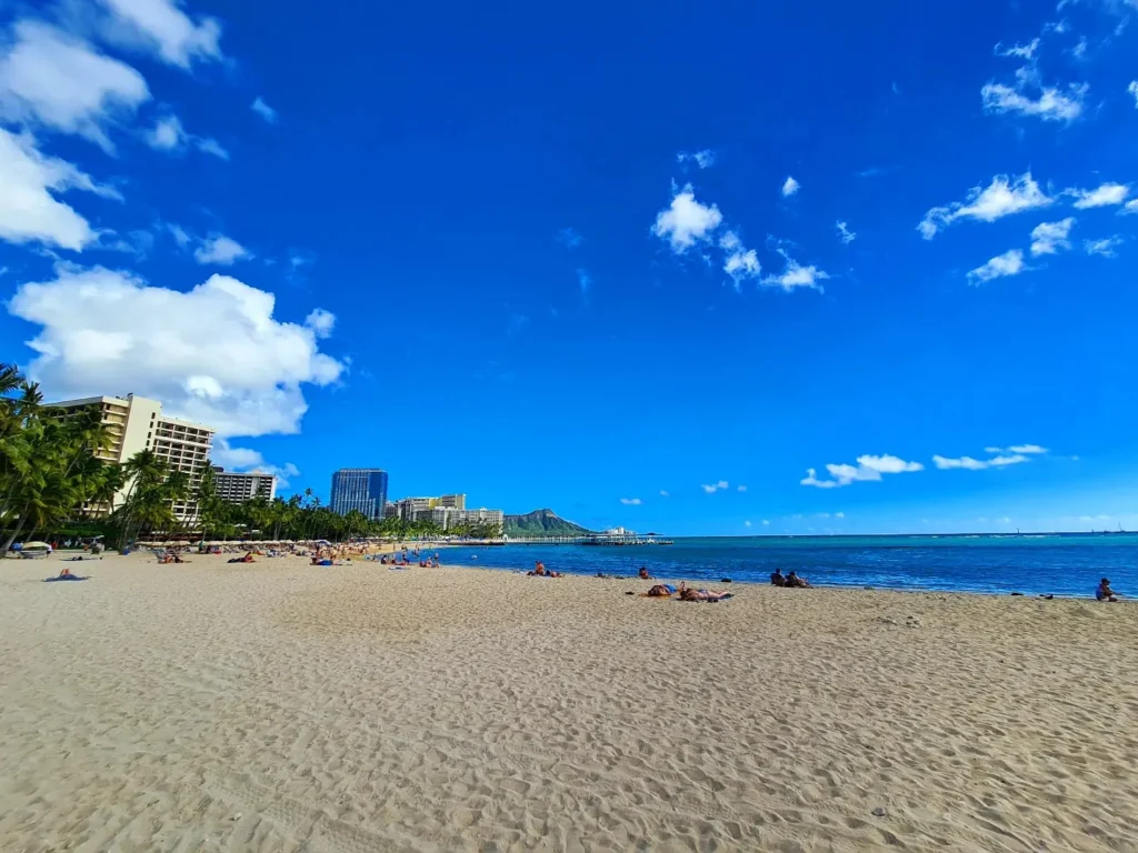 Cruising with Danny and Peter, Holland America Line, Koningsdam, Honolulu, Hawaii, United States | Stunning aerial view of Waikiki Beach from a Hawaii helicopter tour, capturing the turquoise waters, golden sands, and iconic skyline. Majestic Ko'olau Mountains flight showcasing the lush, rugged peaks of Oahu from above. Pearl Harbor aerial view offering a solemn and powerful glimpse of the historic site. Scenic helicopter ride over Hawaii’s coast, revealing the island’s breathtaking landscapes and vibrant colors. An unforgettable Hawaii sightseeing adventure highlighting the beauty of Oahu’s windward coast, north shore, and serene tropical rainforests.
