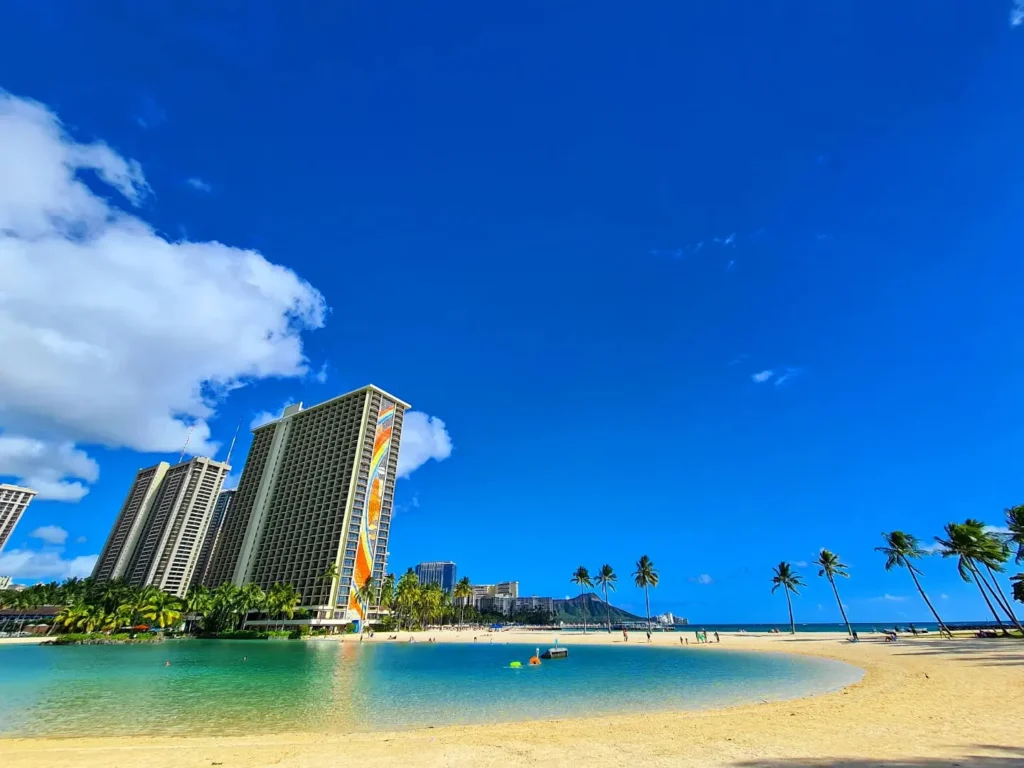 Cruising with Danny and Peter, Holland America Line, Koningsdam, Honolulu, Hawaii, United States | Stunning aerial view of Waikiki Beach from a Hawaii helicopter tour, capturing the turquoise waters, golden sands, and iconic skyline. Majestic Ko'olau Mountains flight showcasing the lush, rugged peaks of Oahu from above. Pearl Harbor aerial view offering a solemn and powerful glimpse of the historic site. Scenic helicopter ride over Hawaii’s coast, revealing the island’s breathtaking landscapes and vibrant colors. An unforgettable Hawaii sightseeing adventure highlighting the beauty of Oahu’s windward coast, north shore, and serene tropical rainforests.