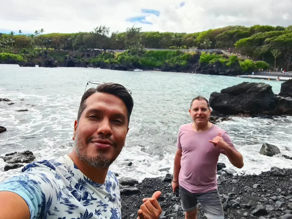 Cruising with Danny and Peter, Holland America Line, Koningsdam, Kahului, Maui, Hawaii, United States | Stunning views along the Road to Hana, showcasing Maui’s breathtaking waterfalls, lush Hana rainforest, captivating black sand beaches, and serene Turtle Beach Maui, with glimpses of whale watching opportunities and picturesque coastal views during this unforgettable Maui road trip adventure.