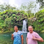 Cruising with Danny and Peter, Holland America Line, Koningsdam, Kahului, Maui, Hawaii, United States | Stunning views along the Road to Hana, showcasing Maui’s breathtaking waterfalls, lush Hana rainforest, captivating black sand beaches, and serene Turtle Beach Maui, with glimpses of whale watching opportunities and picturesque coastal views during this unforgettable Maui road trip adventure.