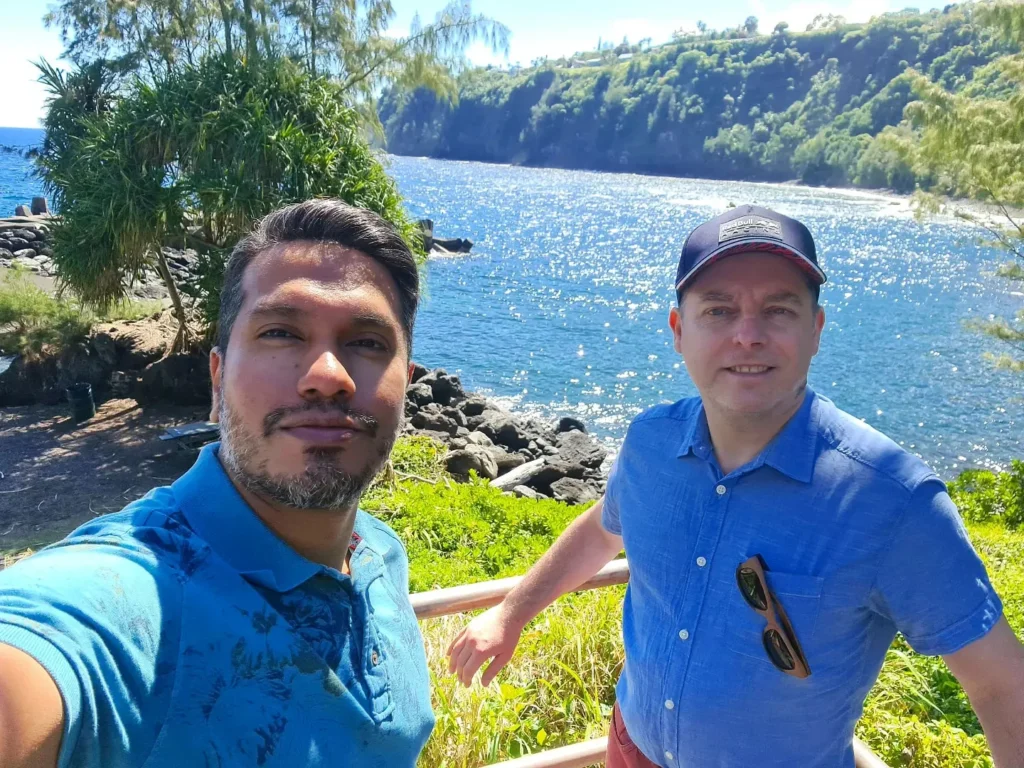 Cruising with Danny and Peter, Holland America Line, Koningsdam, Hilo, Hawaii, United States | Scenic Hamakua Coast Hilo Adventure in Hawaii featuring lush valleys, cascading waterfalls, hidden gems, and breathtaking ocean views along the tropical coastline.