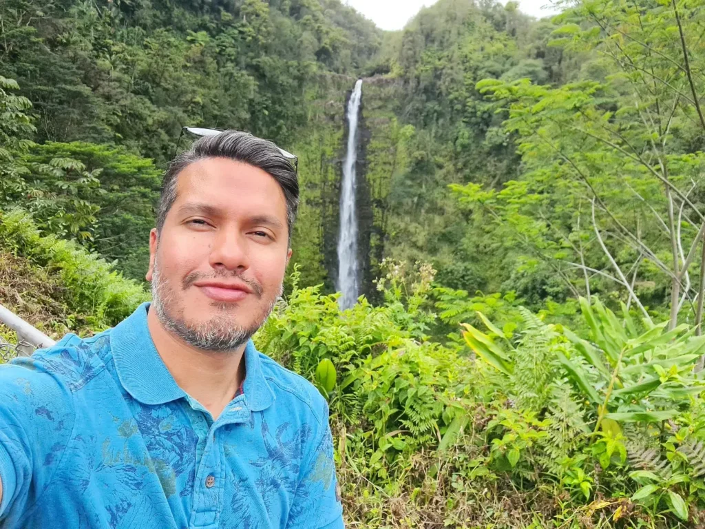 Cruising with Danny and Peter, Holland America Line, Koningsdam, Hilo, Hawaii, United States | Scenic Hamakua Coast Hilo Adventure in Hawaii featuring lush valleys, cascading waterfalls, hidden gems, and breathtaking ocean views along the tropical coastline.