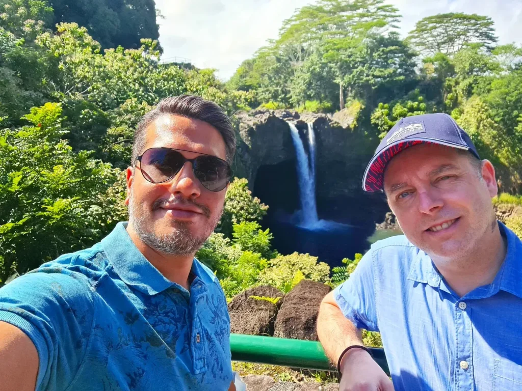 Cruising with Danny and Peter, Holland America Line, Koningsdam, Hilo, Hawaii, United States | Scenic Hamakua Coast Hilo Adventure in Hawaii featuring lush valleys, cascading waterfalls, hidden gems, and breathtaking ocean views along the tropical coastline.