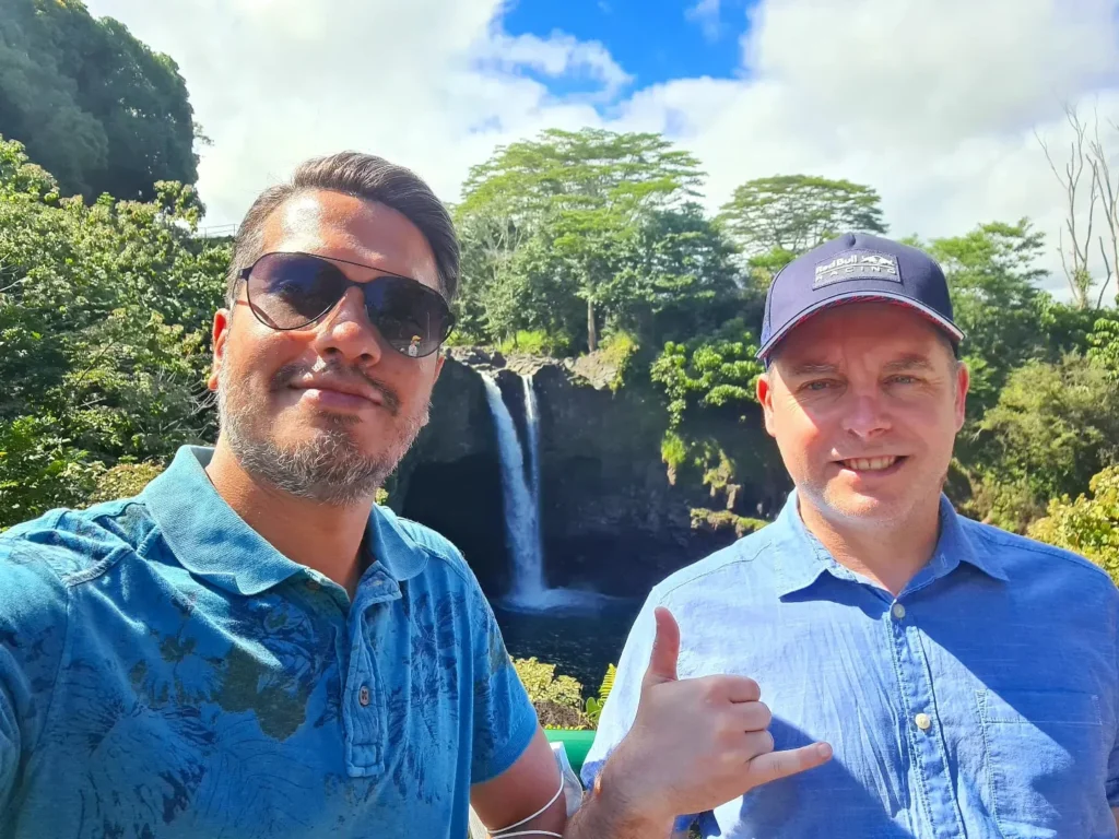 Cruising with Danny and Peter, Holland America Line, Koningsdam, Hilo, Hawaii, United States | Scenic Hamakua Coast Hilo Adventure in Hawaii featuring lush valleys, cascading waterfalls, hidden gems, and breathtaking ocean views along the tropical coastline.