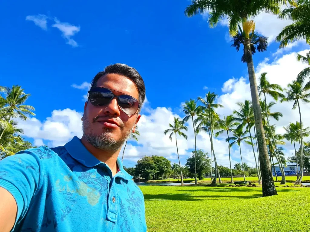 Cruising with Danny and Peter, Holland America Line, Koningsdam, Hilo, Hawaii, United States | Scenic Hamakua Coast Hilo Adventure in Hawaii featuring lush valleys, cascading waterfalls, hidden gems, and breathtaking ocean views along the tropical coastline.