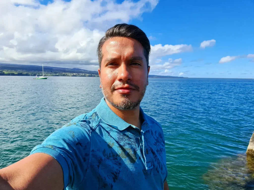 Cruising with Danny and Peter, Holland America Line, Koningsdam, Hilo, Hawaii, United States | Scenic Hamakua Coast Hilo Adventure in Hawaii featuring lush valleys, cascading waterfalls, hidden gems, and breathtaking ocean views along the tropical coastline.