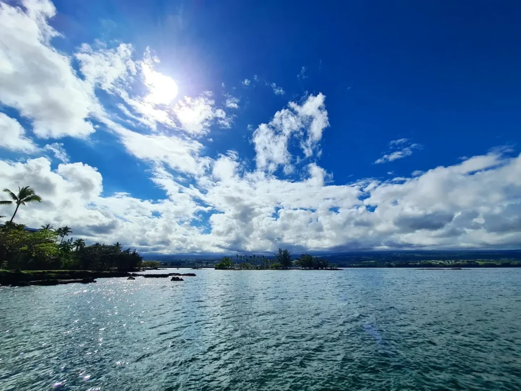 Cruising with Danny and Peter, Holland America Line, Koningsdam, Hilo, Hawaii, United States | Scenic Hamakua Coast Hilo Adventure in Hawaii featuring lush valleys, cascading waterfalls, hidden gems, and breathtaking ocean views along the tropical coastline.