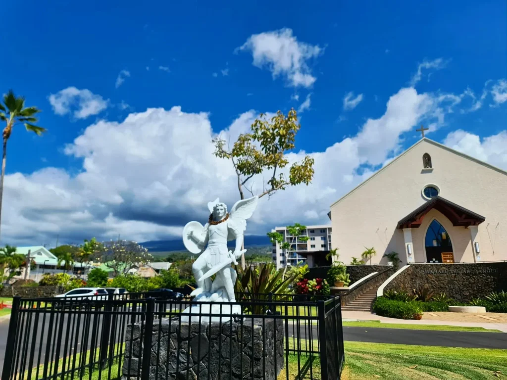 Cruising with Danny and Peter, Holland America Line, Koningsdam, Kona, Hawaii, United-States | A vibrant scene showcasing the beauty of Kona Hawaii, featuring secluded beaches with soft sand and crystal-clear waters, colorful storefronts along the bustling streets, and breathtaking scenic views of the Kona coast during sunset. The image captures the essence of Exploring Kona's Island Charm, highlighting local culture with hula dancers and delicious Hawaiian cuisine served at a beachfront restaurant.