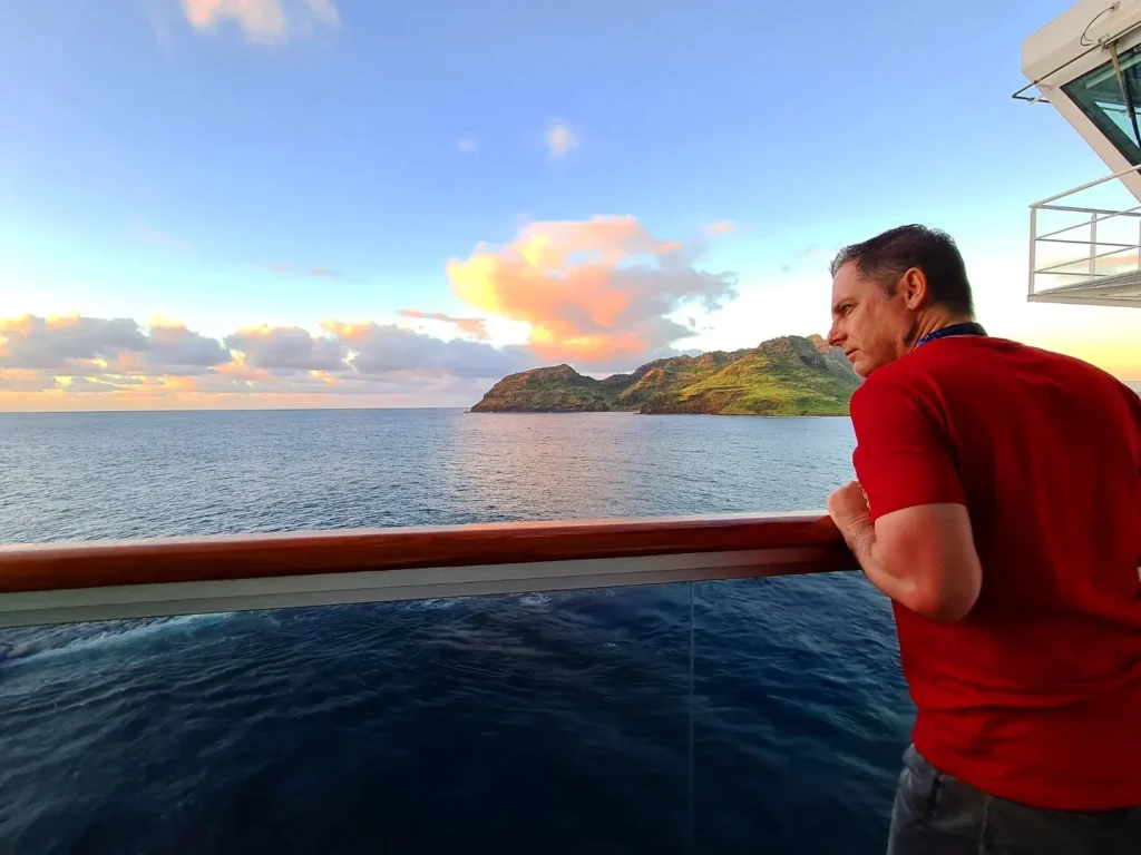 Cruising with Danny and Peter, Holland America Line, Koningsdam, Nawiliwili, Kauai, Hawaii, United States | Scenic views from the Nawiliwili Plantation Railway showcasing lush landscapes of Kauai, tropical fruit plantations, and historic plantation architecture, capturing the essence of a Hawaiian plantation experience.