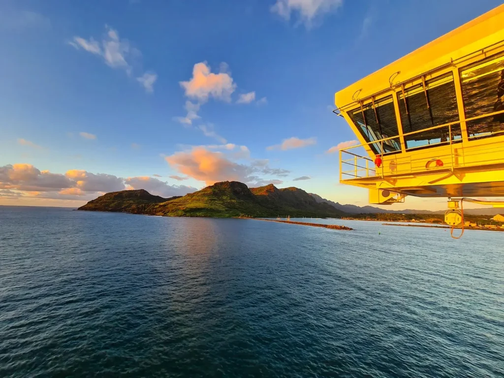 Cruising with Danny and Peter, Holland America Line, Koningsdam, Nawiliwili, Kauai, Hawaii, United States | Scenic views from the Nawiliwili Plantation Railway showcasing lush landscapes of Kauai, tropical fruit plantations, and historic plantation architecture, capturing the essence of a Hawaiian plantation experience.