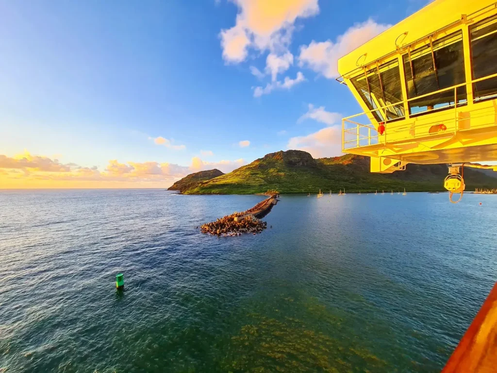 Cruising with Danny and Peter, Holland America Line, Koningsdam, Nawiliwili, Kauai, Hawaii, United States | Scenic views from the Nawiliwili Plantation Railway showcasing lush landscapes of Kauai, tropical fruit plantations, and historic plantation architecture, capturing the essence of a Hawaiian plantation experience.