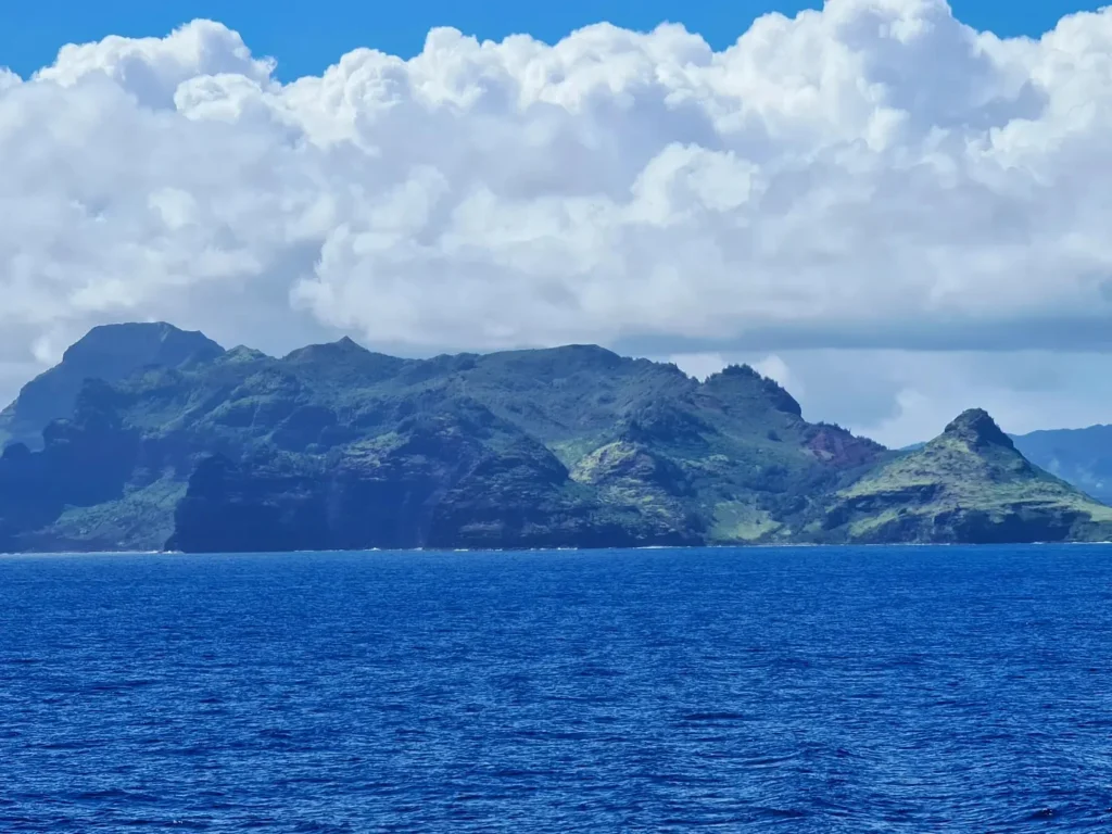 Cruising with Danny and Peter, Holland America Line, Koningsdam, Nawiliwili, Kauai, Hawaii, United States | Scenic views from the Nawiliwili Plantation Railway showcasing lush landscapes of Kauai, tropical fruit plantations, and historic plantation architecture, capturing the essence of a Hawaiian plantation experience.