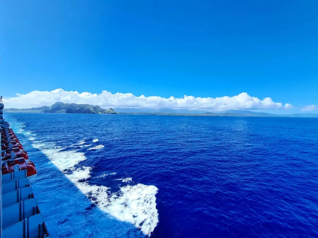 Cruising with Danny and Peter, Holland America Line, Koningsdam, Nawiliwili, Kauai, Hawaii, United States | Scenic views from the Nawiliwili Plantation Railway showcasing lush landscapes of Kauai, tropical fruit plantations, and historic plantation architecture, capturing the essence of a Hawaiian plantation experience.