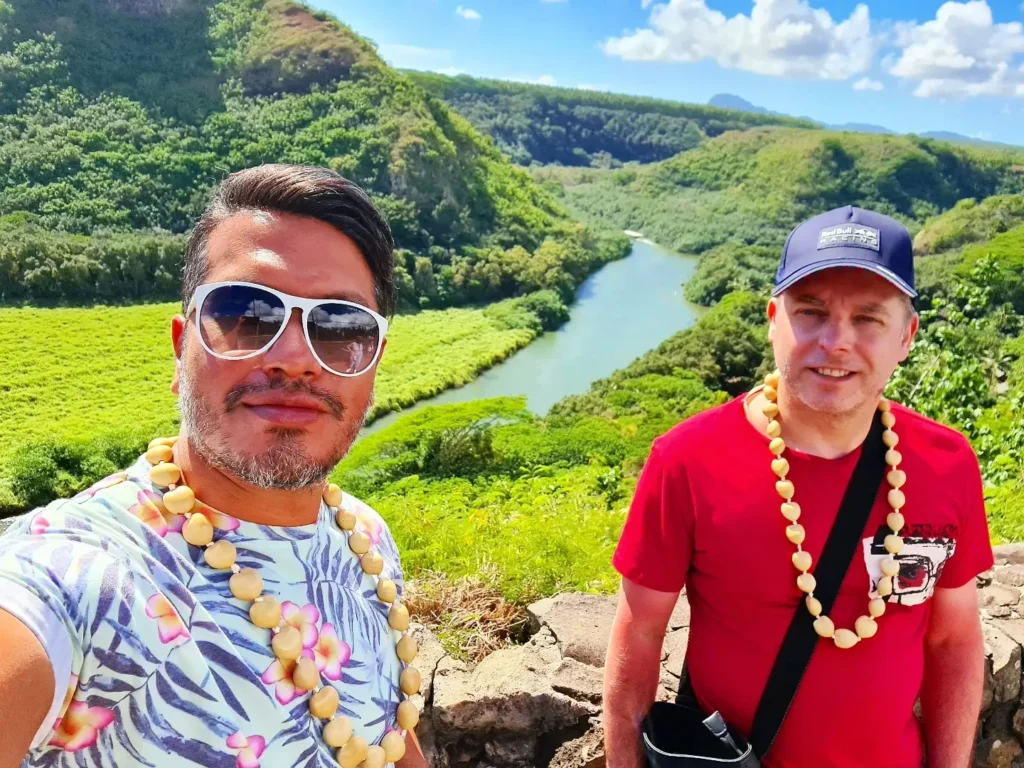 Cruising with Danny and Peter, Holland America Line, Koningsdam, Nawiliwili, Kauai, Hawaii, United States | Scenic views from the Nawiliwili Plantation Railway showcasing lush landscapes of Kauai, tropical fruit plantations, and historic plantation architecture, capturing the essence of a Hawaiian plantation experience.