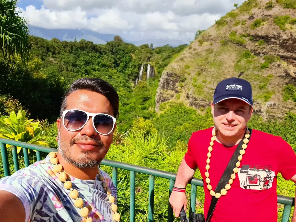 Cruising with Danny and Peter, Holland America Line, Koningsdam, Nawiliwili, Kauai, Hawaii, United States | Scenic views from the Nawiliwili Plantation Railway showcasing lush landscapes of Kauai, tropical fruit plantations, and historic plantation architecture, capturing the essence of a Hawaiian plantation experience.