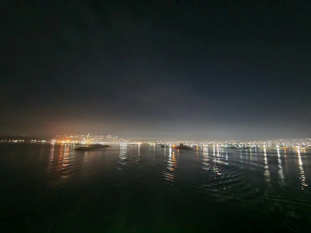 Cruising with Danny and Peter, Holland America Line, Koningsdam, Ensenada, Mexico | An enchanting evening at Ensenada Mexican Folklore, showcasing vibrant traditional Mexican dance performances and lively mariachi music, capturing the essence of Mexican culture in the coastal city of Ensenada. The stage is illuminated with colorful lights, and dancers in elaborate costumes mesmerize the audience, creating a joyful atmosphere that embodies the spirit of a Mexican heritage celebration.