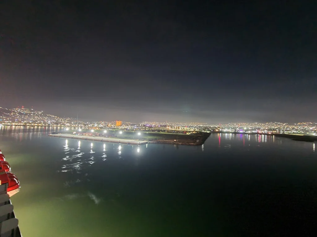 Cruising with Danny and Peter, Holland America Line, Koningsdam, Ensenada, Mexico | An enchanting evening at Ensenada Mexican Folklore, showcasing vibrant traditional Mexican dance performances and lively mariachi music, capturing the essence of Mexican culture in the coastal city of Ensenada. The stage is illuminated with colorful lights, and dancers in elaborate costumes mesmerize the audience, creating a joyful atmosphere that embodies the spirit of a Mexican heritage celebration.