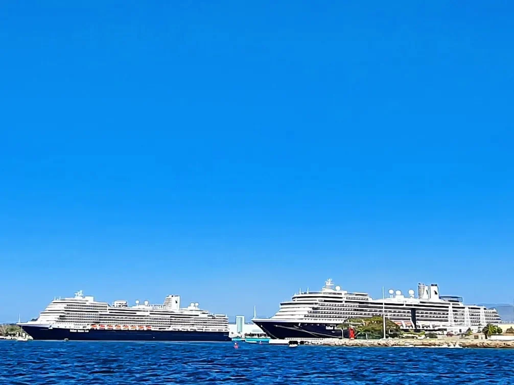 Cruising with Danny and Peter, Holland America Line, Koningsdam, Puerto Vallarta, Mexico | Las Caletas Beach in Puerto Vallarta featuring serene sandy shores, lush tropical greenery, and guests enjoying a relaxing beach day. The scene captures the essence of a secluded beach getaway with clear blue waters, vibrant Mexican cuisine, and the tranquil atmosphere of this hidden gem.
