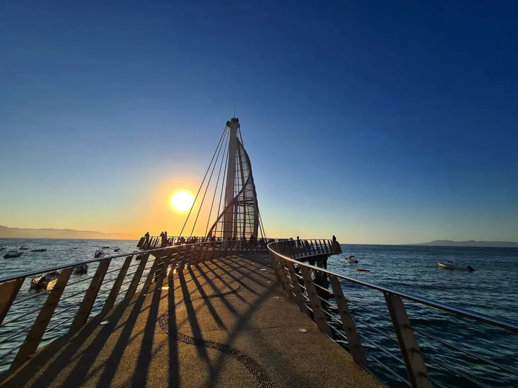 Cruising with Danny and Peter, Holland America Line, Koningsdam, Puerto Vallarta, Mexico | Las Caletas Beach in Puerto Vallarta featuring serene sandy shores, lush tropical greenery, and guests enjoying a relaxing beach day. The scene captures the essence of a secluded beach getaway with clear blue waters, vibrant Mexican cuisine, and the tranquil atmosphere of this hidden gem.