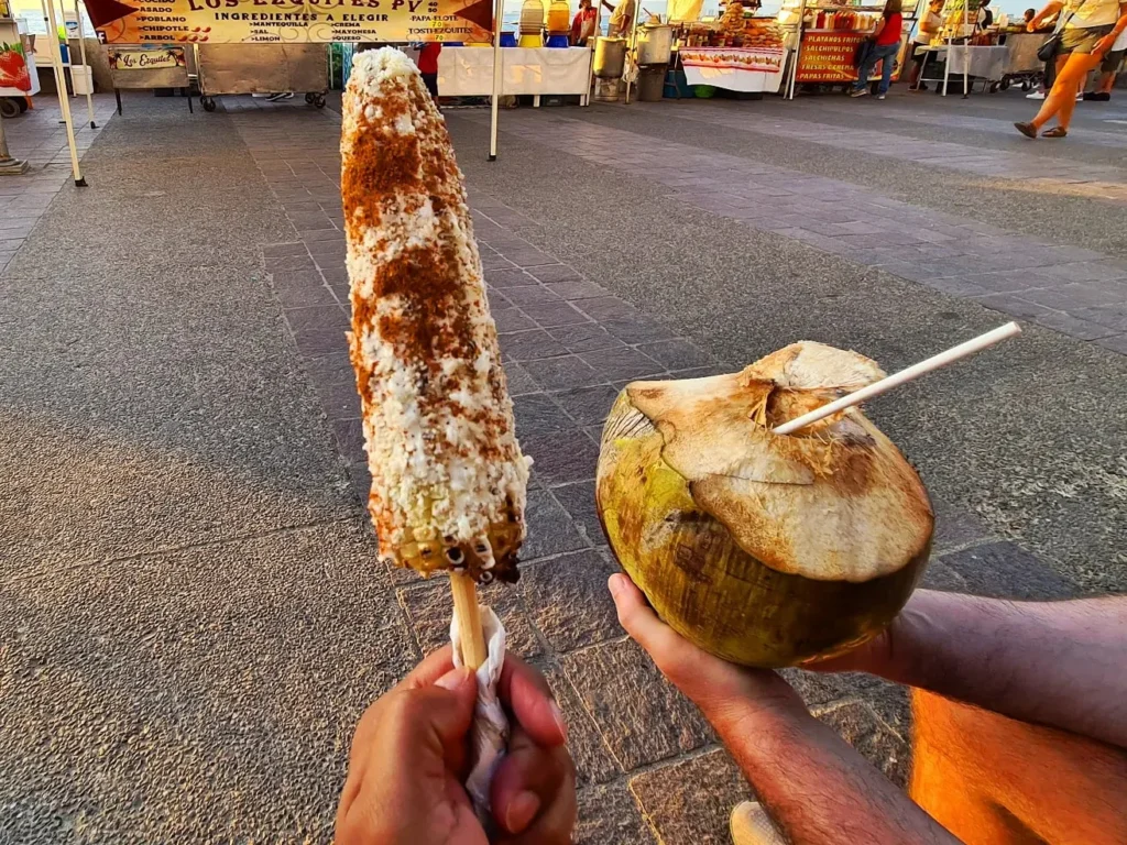 Cruising with Danny and Peter, Holland America Line, Koningsdam, Puerto Vallarta, Mexico | Las Caletas Beach in Puerto Vallarta featuring serene sandy shores, lush tropical greenery, and guests enjoying a relaxing beach day. The scene captures the essence of a secluded beach getaway with clear blue waters, vibrant Mexican cuisine, and the tranquil atmosphere of this hidden gem.
