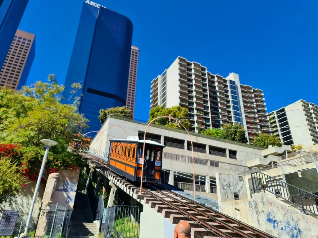 Cruising with Danny and Peter, Holland America Line, Koningsdam, Los Angeles, California, United States | Images of exploring downtown Los Angeles: the historic Angel's Flight railway, vibrant Grand Central Market dining experiences, the architectural beauty of Walt Disney Concert Hall, and engaging Grammy Museum exhibits showcasing the LA art and music scene.
