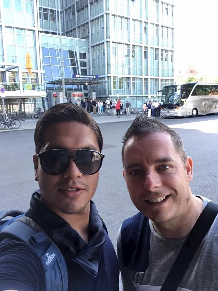 Embarking on an Exclusive Berlin Day Trip from Rostock on Holland America Line 2 Cruising with Danny and Peter, Holland America Line, Zuiderdam, Rostock, Berlin, Germany | Private train journey from Rostock to Berlin featuring scenic German countryside views; exploring Berlin's historical landmarks including Checkpoint Charlie and Brandenburg Gate on an exclusive day trip with Holland America Line.