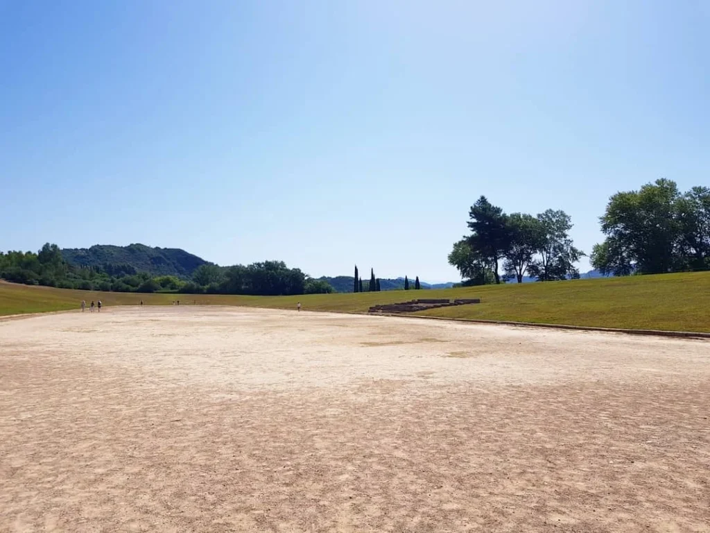 Cruising with Danny and Peter, Holland America Line, Koningsdam, Katakolon, Olympia, Greece | View of Ancient Olympia landmarks during the Katakolon Ancient Olympia Tour, featuring historic ruins and Olympic Games heritage, followed by Sel de Mer seafood dining on a luxurious day trip from Katakolon to Olympia, showcasing Greek cultural exploration and culinary delights.