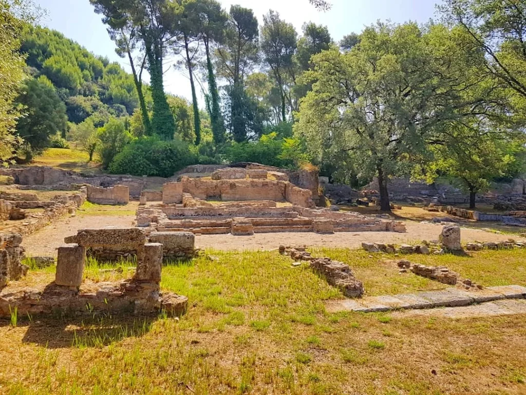 Cruising with Danny and Peter, Holland America Line, Koningsdam, Katakolon, Olympia, Greece | View of Ancient Olympia landmarks during the Katakolon Ancient Olympia Tour, featuring historic ruins and Olympic Games heritage, followed by Sel de Mer seafood dining on a luxurious day trip from Katakolon to Olympia, showcasing Greek cultural exploration and culinary delights.