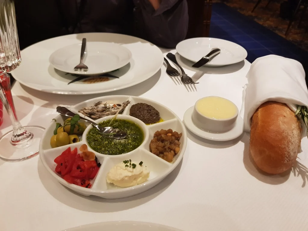 Cruising with Danny and Peter, Holland America Line, Koningsdam, Katakolon, Olympia, Greece | View of Ancient Olympia landmarks during the Katakolon Ancient Olympia Tour, featuring historic ruins and Olympic Games heritage, followed by Sel de Mer seafood dining on a luxurious day trip from Katakolon to Olympia, showcasing Greek cultural exploration and culinary delights.