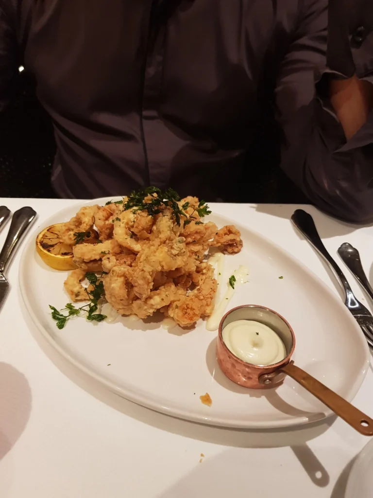 Cruising with Danny and Peter, Holland America Line, Koningsdam, Katakolon, Olympia, Greece | View of Ancient Olympia landmarks during the Katakolon Ancient Olympia Tour, featuring historic ruins and Olympic Games heritage, followed by Sel de Mer seafood dining on a luxurious day trip from Katakolon to Olympia, showcasing Greek cultural exploration and culinary delights.