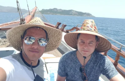 Cruising with Danny and Peter, Holland America Line, Koningsdam, Piraeus, Athens, Greece | Beautiful sailing around Athens, showcasing a scenic journey through the Aegean Sea, visiting the charming islands of Hydra, Poros, and Aegina. Explore the historic Hydra island with its whitewashed houses and picturesque harbor, dive into crystal-clear waters for snorkeling at Poros, and experience the vibrant Aegina port with its iconic neoclassical architecture and pistachio groves. Capture the essence of a Greek island sailing tour, enjoying an Athens maritime experience filled with adventure and breathtaking views of the Saronic Gulf.