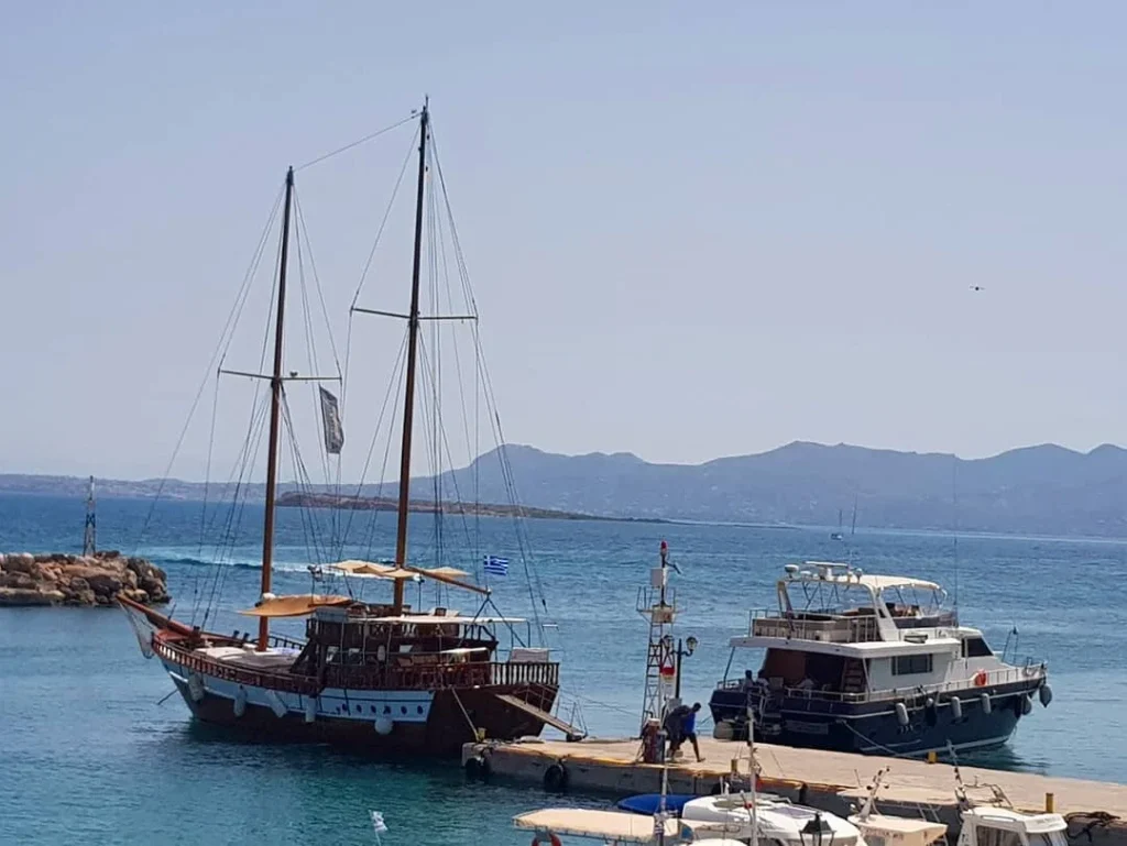 Cruising with Danny and Peter, Holland America Line, Koningsdam, Piraeus, Athens, Greece | Beautiful sailing around Athens, showcasing a scenic journey through the Aegean Sea, visiting the charming islands of Hydra, Poros, and Aegina. Explore the historic Hydra island with its whitewashed houses and picturesque harbor, dive into crystal-clear waters for snorkeling at Poros, and experience the vibrant Aegina port with its iconic neoclassical architecture and pistachio groves. Capture the essence of a Greek island sailing tour, enjoying an Athens maritime experience filled with adventure and breathtaking views of the Saronic Gulf.