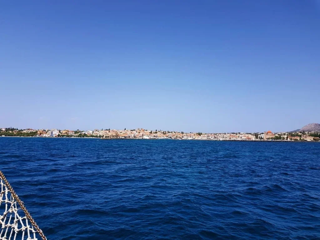 Cruising with Danny and Peter, Holland America Line, Koningsdam, Piraeus, Athens, Greece | Beautiful sailing around Athens, showcasing a scenic journey through the Aegean Sea, visiting the charming islands of Hydra, Poros, and Aegina. Explore the historic Hydra island with its whitewashed houses and picturesque harbor, dive into crystal-clear waters for snorkeling at Poros, and experience the vibrant Aegina port with its iconic neoclassical architecture and pistachio groves. Capture the essence of a Greek island sailing tour, enjoying an Athens maritime experience filled with adventure and breathtaking views of the Saronic Gulf.