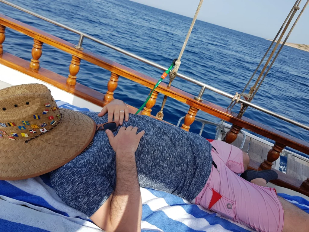 Cruising with Danny and Peter, Holland America Line, Koningsdam, Piraeus, Athens, Greece | Beautiful sailing around Athens, showcasing a scenic journey through the Aegean Sea, visiting the charming islands of Hydra, Poros, and Aegina. Explore the historic Hydra island with its whitewashed houses and picturesque harbor, dive into crystal-clear waters for snorkeling at Poros, and experience the vibrant Aegina port with its iconic neoclassical architecture and pistachio groves. Capture the essence of a Greek island sailing tour, enjoying an Athens maritime experience filled with adventure and breathtaking views of the Saronic Gulf.