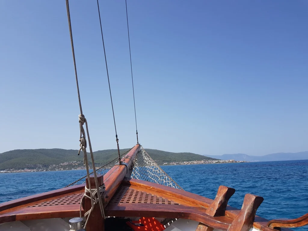 Cruising with Danny and Peter, Holland America Line, Koningsdam, Piraeus, Athens, Greece | Beautiful sailing around Athens, showcasing a scenic journey through the Aegean Sea, visiting the charming islands of Hydra, Poros, and Aegina. Explore the historic Hydra island with its whitewashed houses and picturesque harbor, dive into crystal-clear waters for snorkeling at Poros, and experience the vibrant Aegina port with its iconic neoclassical architecture and pistachio groves. Capture the essence of a Greek island sailing tour, enjoying an Athens maritime experience filled with adventure and breathtaking views of the Saronic Gulf.