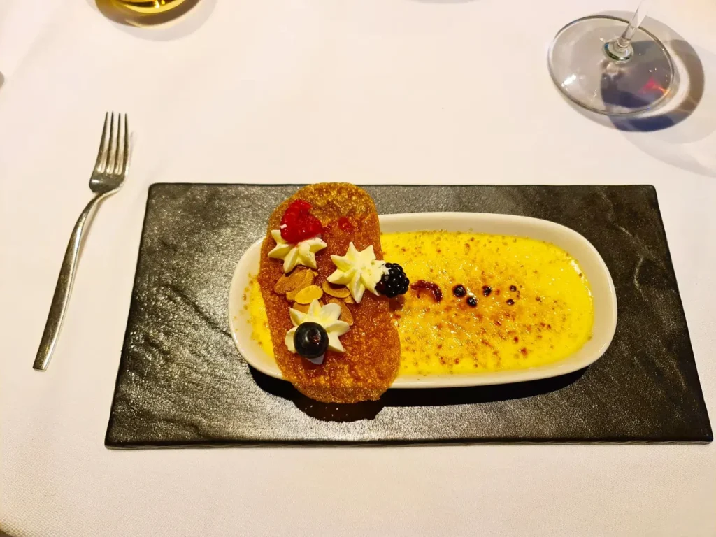 Cruising with Danny and Peter, Holland America Line, Oosterdam, Kotor, Montenegro | Stunning view of Kotor Bay, showcasing the charming villages and scenic beaches of Montenegro. The image features the medieval architecture of Budva Old Town, the crystal-clear waters of Jaz Beach, and the picturesque landscapes of Brajići, highlighting the cultural heritage and natural beauty of the Adriatic Coast.