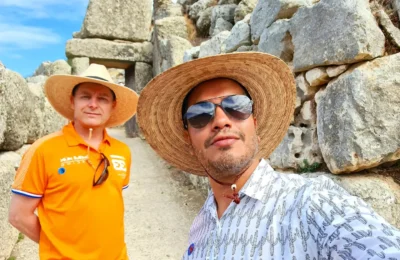 Cruising with Danny and Peter, Holland America Line, Oosterdam, Nafplion, Greece | Explore the ancient ruins of Mycenae and Epidaurus in Greece, featuring the iconic Lion Gate of Mycenae, the tomb of King Agamemnon, and the Epidaurus Theater with its renowned acoustics. Experience the rich cultural heritage of Ancient Greek architecture and discover these UNESCO World Heritage Peloponnese archaeological sites. Complete your journey with stunning views of the Venetian fortress in Náfplion, showcasing Greece's timeless history and architectural marvels.