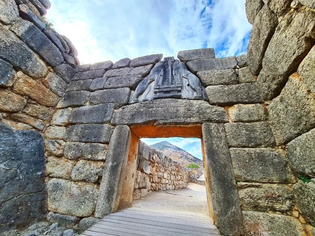 Cruising with Danny and Peter, Holland America Line, Oosterdam, Nafplion, Greece | Explore the ancient ruins of Mycenae and Epidaurus in Greece, featuring the iconic Lion Gate of Mycenae, the tomb of King Agamemnon, and the Epidaurus Theater with its renowned acoustics. Experience the rich cultural heritage of Ancient Greek architecture and discover these UNESCO World Heritage Peloponnese archaeological sites. Complete your journey with stunning views of the Venetian fortress in Náfplion, showcasing Greece's timeless history and architectural marvels.