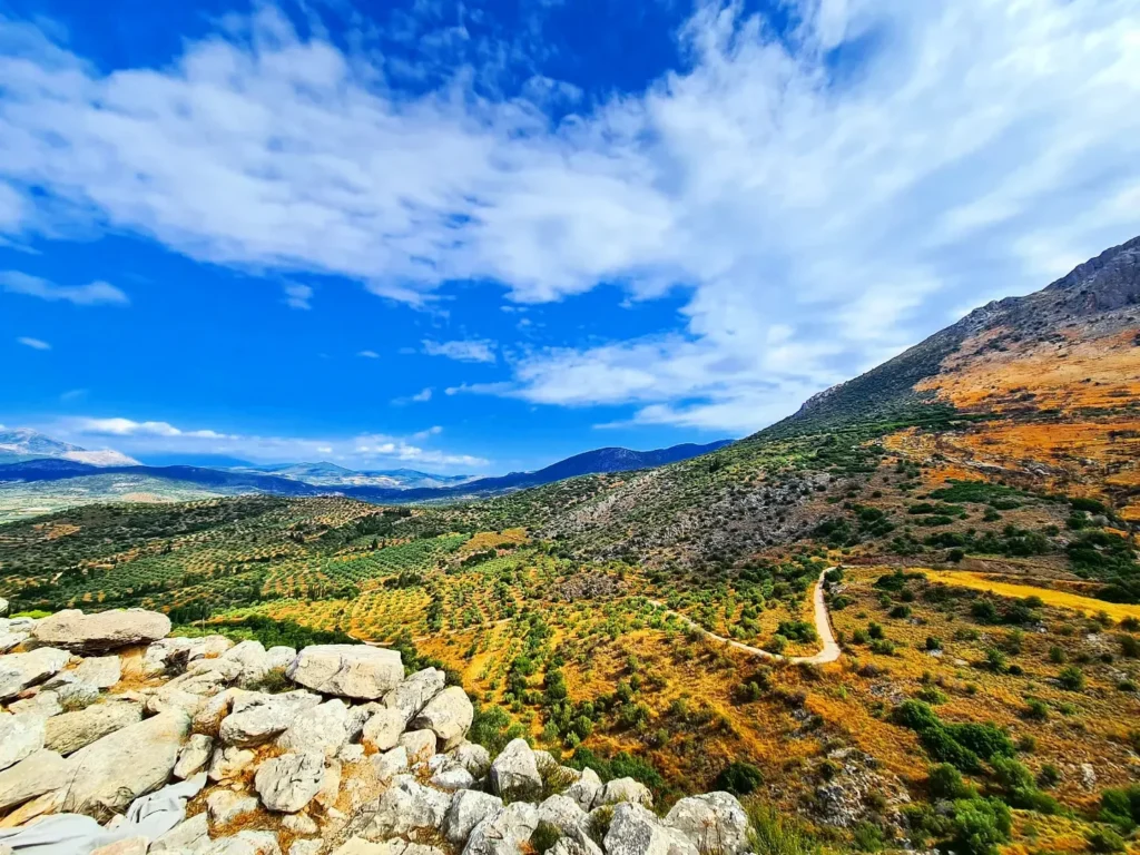 Cruising with Danny and Peter, Holland America Line, Oosterdam, Nafplion, Greece | Explore the ancient ruins of Mycenae and Epidaurus in Greece, featuring the iconic Lion Gate of Mycenae, the tomb of King Agamemnon, and the Epidaurus Theater with its renowned acoustics. Experience the rich cultural heritage of Ancient Greek architecture and discover these UNESCO World Heritage Peloponnese archaeological sites. Complete your journey with stunning views of the Venetian fortress in Náfplion, showcasing Greece's timeless history and architectural marvels.