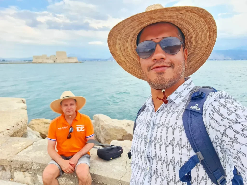 Cruising with Danny and Peter, Holland America Line, Oosterdam, Nafplion, Greece | Explore the ancient ruins of Mycenae and Epidaurus in Greece, featuring the iconic Lion Gate of Mycenae, the tomb of King Agamemnon, and the Epidaurus Theater with its renowned acoustics. Experience the rich cultural heritage of Ancient Greek architecture and discover these UNESCO World Heritage Peloponnese archaeological sites. Complete your journey with stunning views of the Venetian fortress in Náfplion, showcasing Greece's timeless history and architectural marvels.