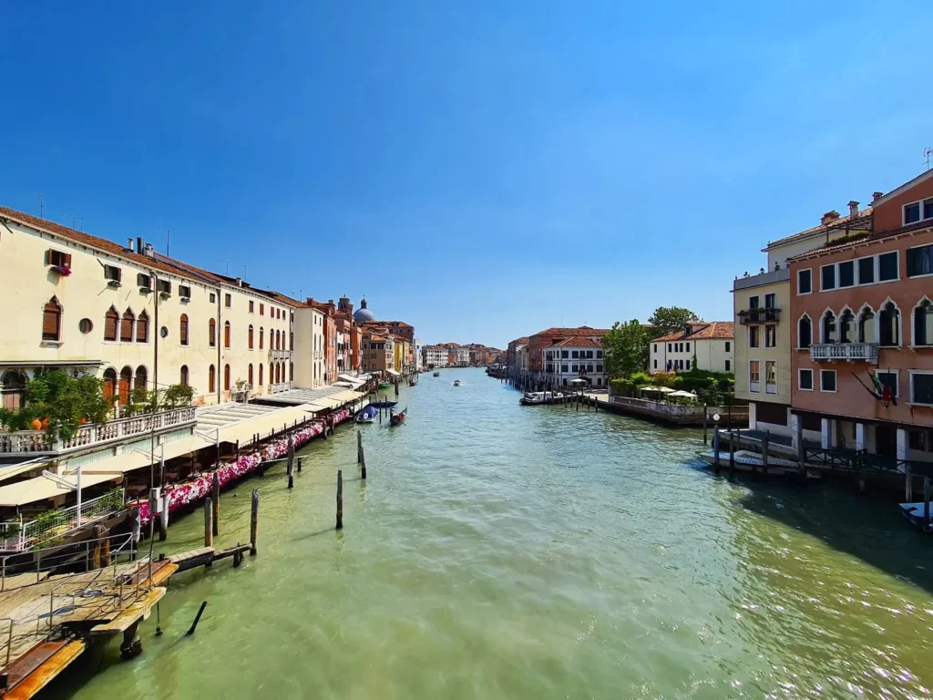 Cruising with Danny and Peter, Holland America Line, Oosterdam, Trieste, Venice, Italy | Stunning views of the Adriatic coastline from our cruise ship, romantic gondola ride through Venice canals, iconic St. Mark’s Basilica, historic Rialto Bridge, and bustling Venetian piazza—all highlights of our Venice Gondola Ride and City Tour during the Adriatic Adventure.