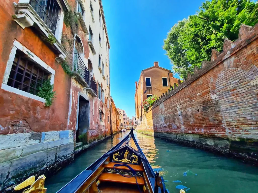 Cruising with Danny and Peter, Holland America Line, Oosterdam, Trieste, Venice, Italy | Stunning views of the Adriatic coastline from our cruise ship, romantic gondola ride through Venice canals, iconic St. Mark’s Basilica, historic Rialto Bridge, and bustling Venetian piazza—all highlights of our Venice Gondola Ride and City Tour during the Adriatic Adventure.