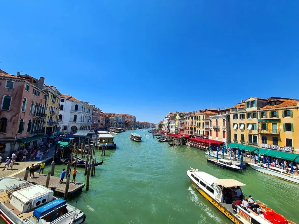 Cruising with Danny and Peter, Holland America Line, Oosterdam, Trieste, Venice, Italy | Stunning views of the Adriatic coastline from our cruise ship, romantic gondola ride through Venice canals, iconic St. Mark’s Basilica, historic Rialto Bridge, and bustling Venetian piazza—all highlights of our Venice Gondola Ride and City Tour during the Adriatic Adventure.