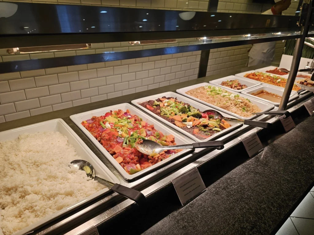 Cruising with Danny and Peter, P&O Ferries, Pride of Rotterdam, Spido, James Cook, Rotterdam, The Netherlands | A stunning Rotterdam mini cruise experience during World Port Days, starting from Beneluxhaven aboard the Pride of Rotterdam, surrounded by massive container ships and barges. Highlights include breathtaking views of the iconic Erasmus Bridge with its swan-like cables over the Nieuwe Maas river, and a sunset scene at Wilhelminakade with its modern skyscrapers and bustling port activities. The evening Spido harbor tour on the James Cook offered an illuminated view of Rotterdam's busy harbor, passing the majestic SS Rotterdam ship, a symbol of the city’s maritime heritage. The day concluded with a vibrant boat parade featuring illuminated vessels, followed by a spectacular fireworks display lighting up the Rotterdam skyline.