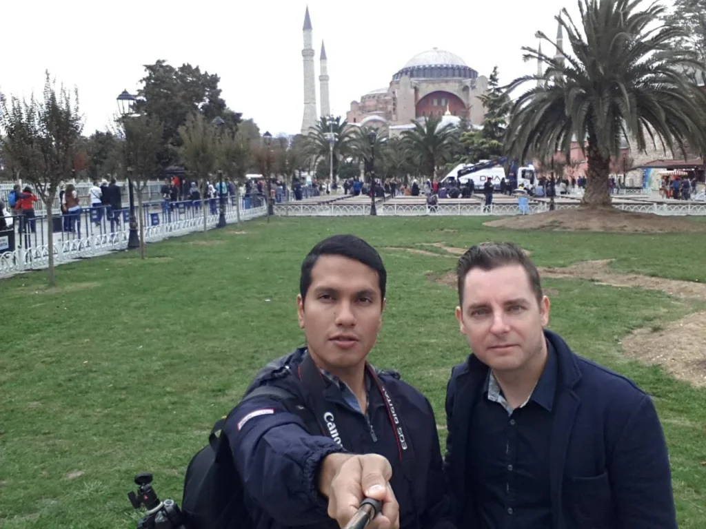 Cruising with Danny and Peter, Holland America Line, Ryndam, Istanbul, Turkey | A scenic view of the m/s Ryndam during our Mediterranean cruise adventure in Istanbul, showcasing the iconic Ayasofya (Hagia Sophia) and the magnificent Blue Mosque, with vibrant street life in Sultanahmet Square, highlighting the cultural richness of our luxury cruise experience.